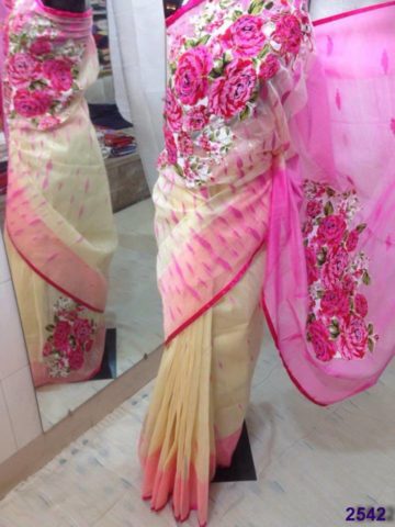 Cream color body & Pink color Acho with pink color work. A broad shade on Paar. Applique Work on Jamdani Shari